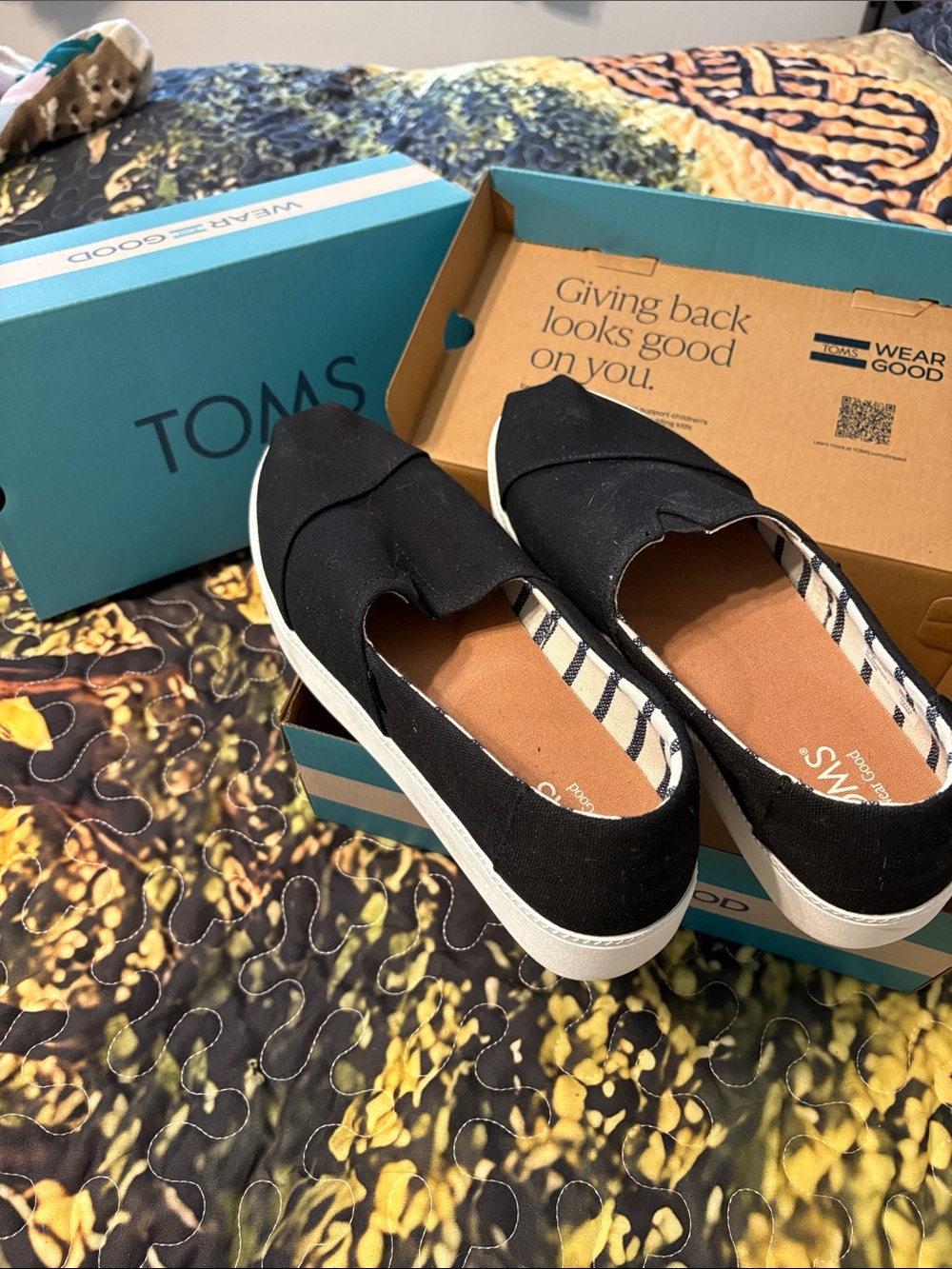 TOMS Black Canvas Slip-On Sneakers with White Sole